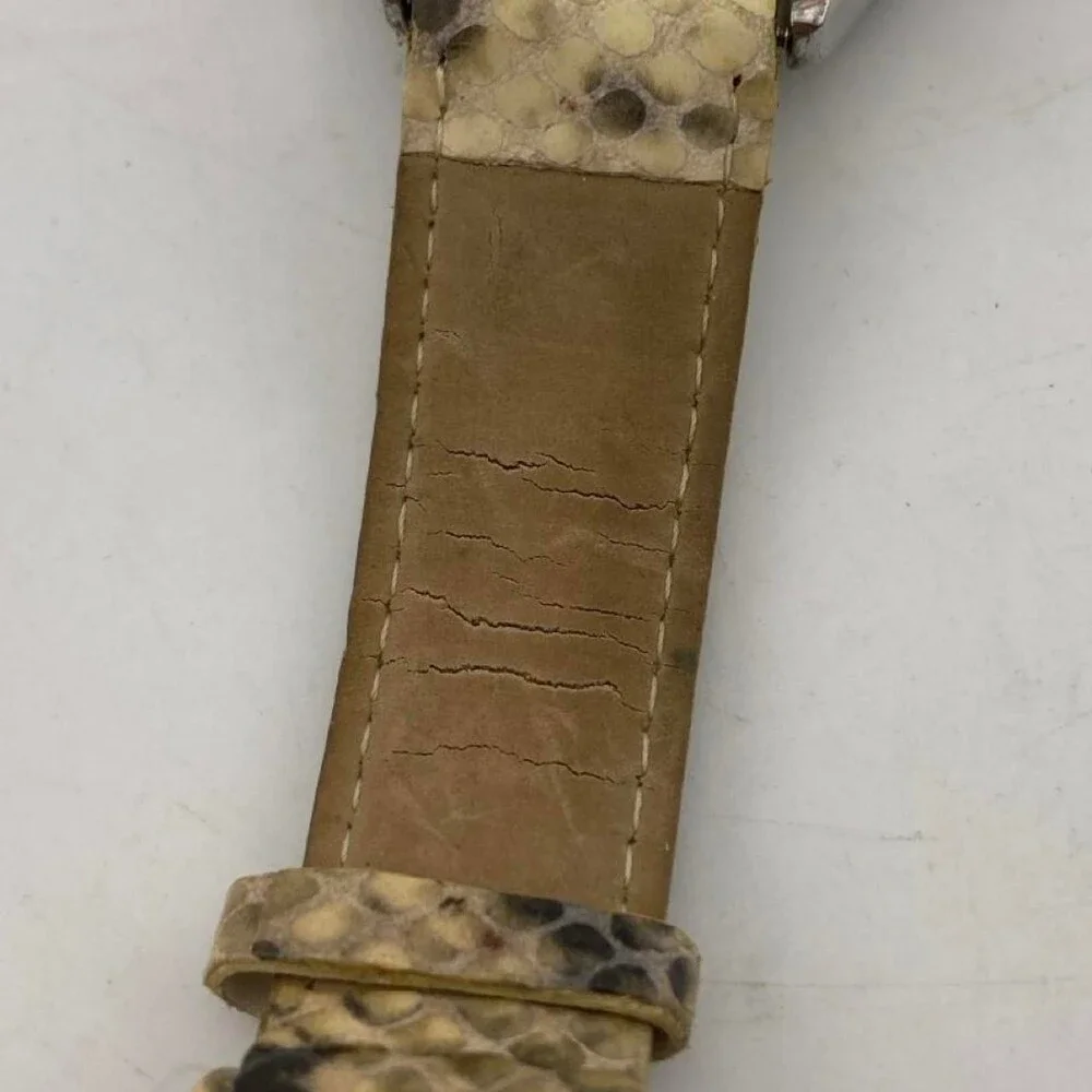 CHICO’S Women's Quartz Watch with Beige Snake-Print Leather Strap. It has a styl